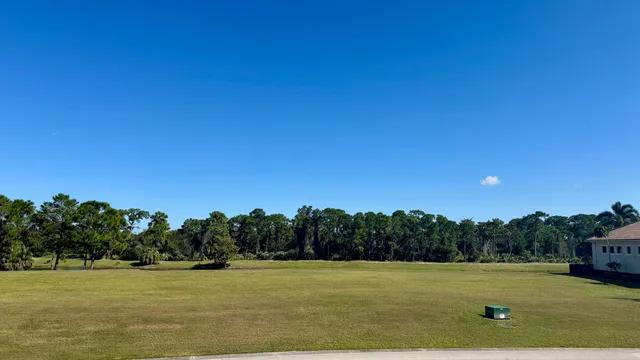 a view of a field with an outdoor space