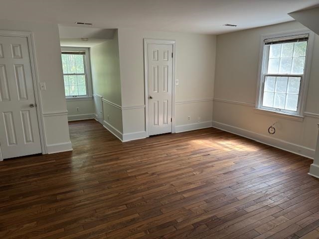 1409 Roper Road Bolivar, TN 38008 - Photo 16 of 33 Unfurnished room with dark hardwood / wood-style flooring