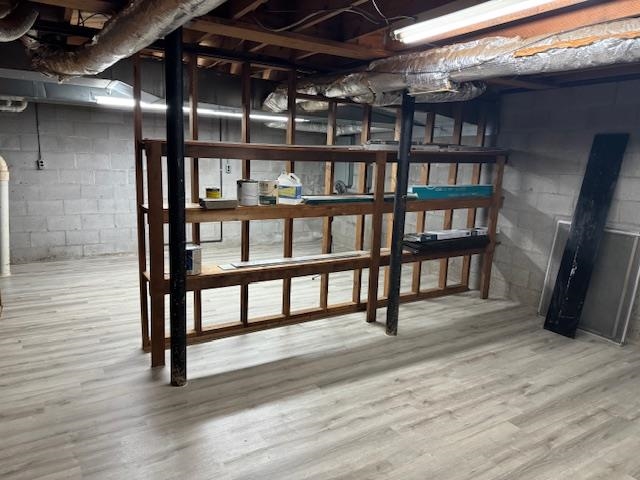 1409 Roper Road Bolivar, TN 38008 - Photo 27 of 33 Basement with hardwood / wood-style floors