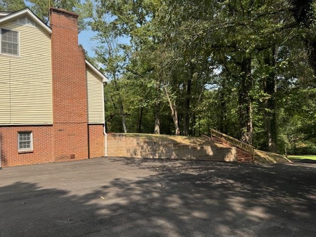 1409 Roper Road Bolivar, TN 38008 - Photo 3 of 33 View of side of home