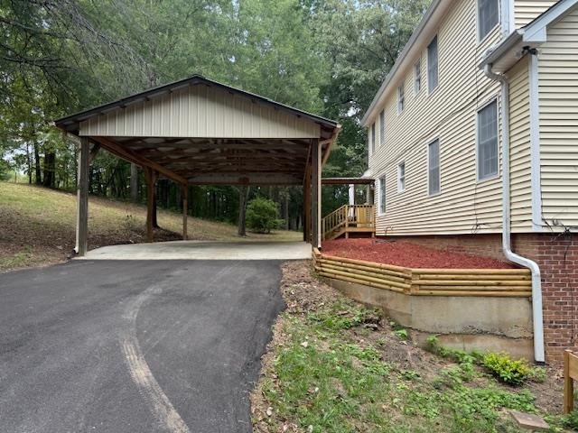 1409 Roper Road Bolivar, TN 38008 - Photo 4 of 33 Exterior space with a carport