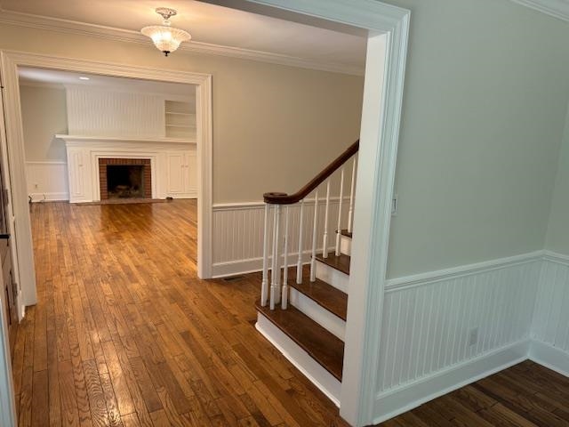 1409 Roper Road Bolivar, TN 38008 - Photo 6 of 33 Hall with dark wood-type flooring and ornamental molding