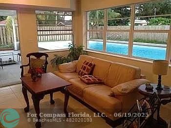236 East 56th Street Hialeah, FL 33013 - Photo 1 of 7 a living room with furniture