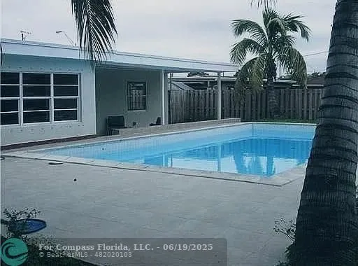 a view of a house with a patio