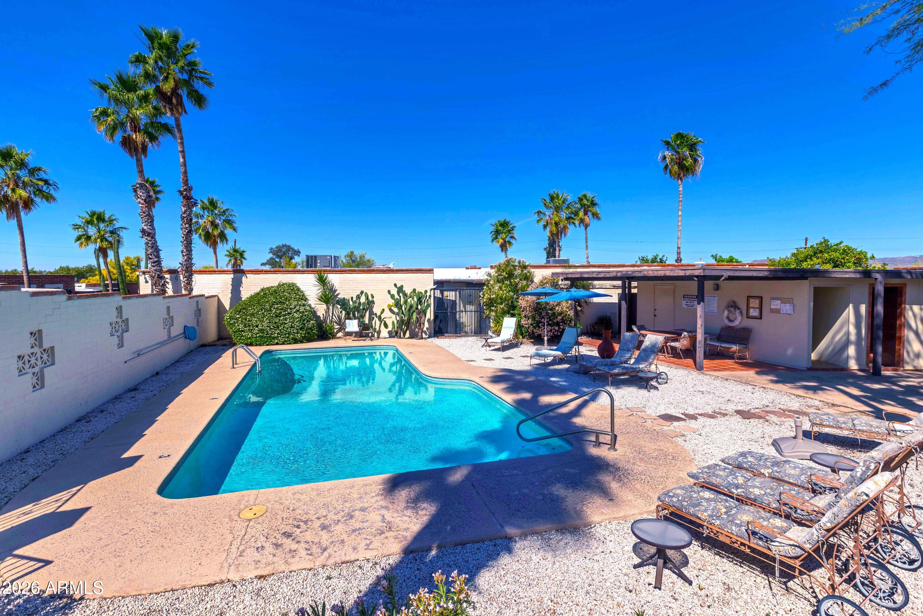9111 North Oracle Road, Unit 110 Tucson, AZ 85704 - Photo 21 of 27 swimming pool view with a sitting space
