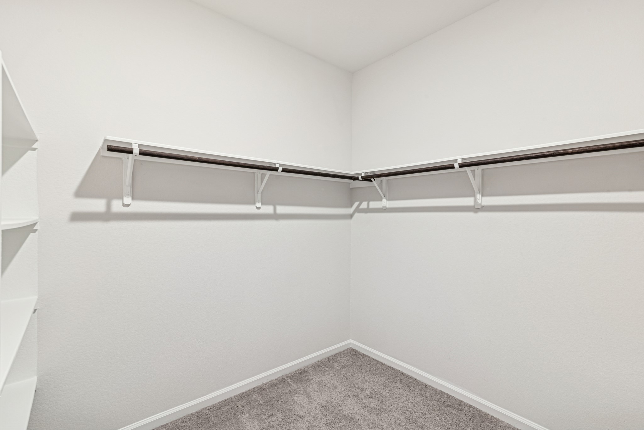 1903 Temple Grove Drive Rosharon, TX 77583 - Photo 22 of 37 The Avery- Primary Walk-In Closet with Built-In Shelving