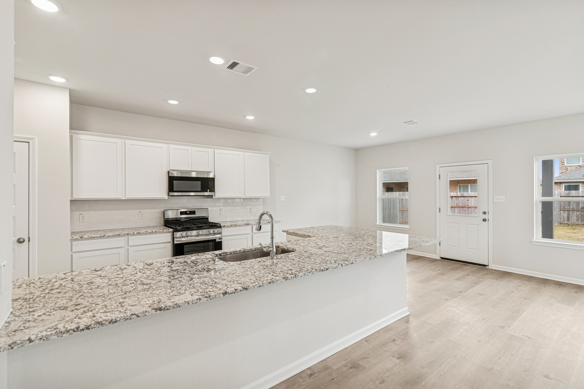 1903 Temple Grove Drive Rosharon, TX 77583 - Photo 8 of 37 The Avery- Kitchen into Breakfast Area