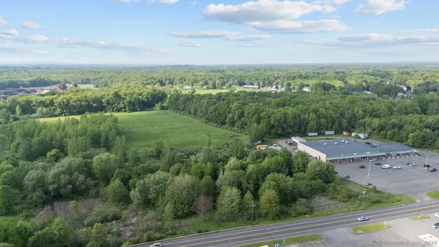an aerial view of a city with lots of residential buildings