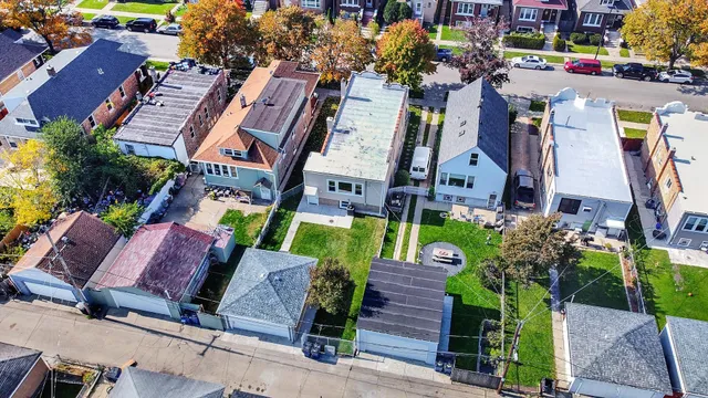 an aerial view of a building with garden
