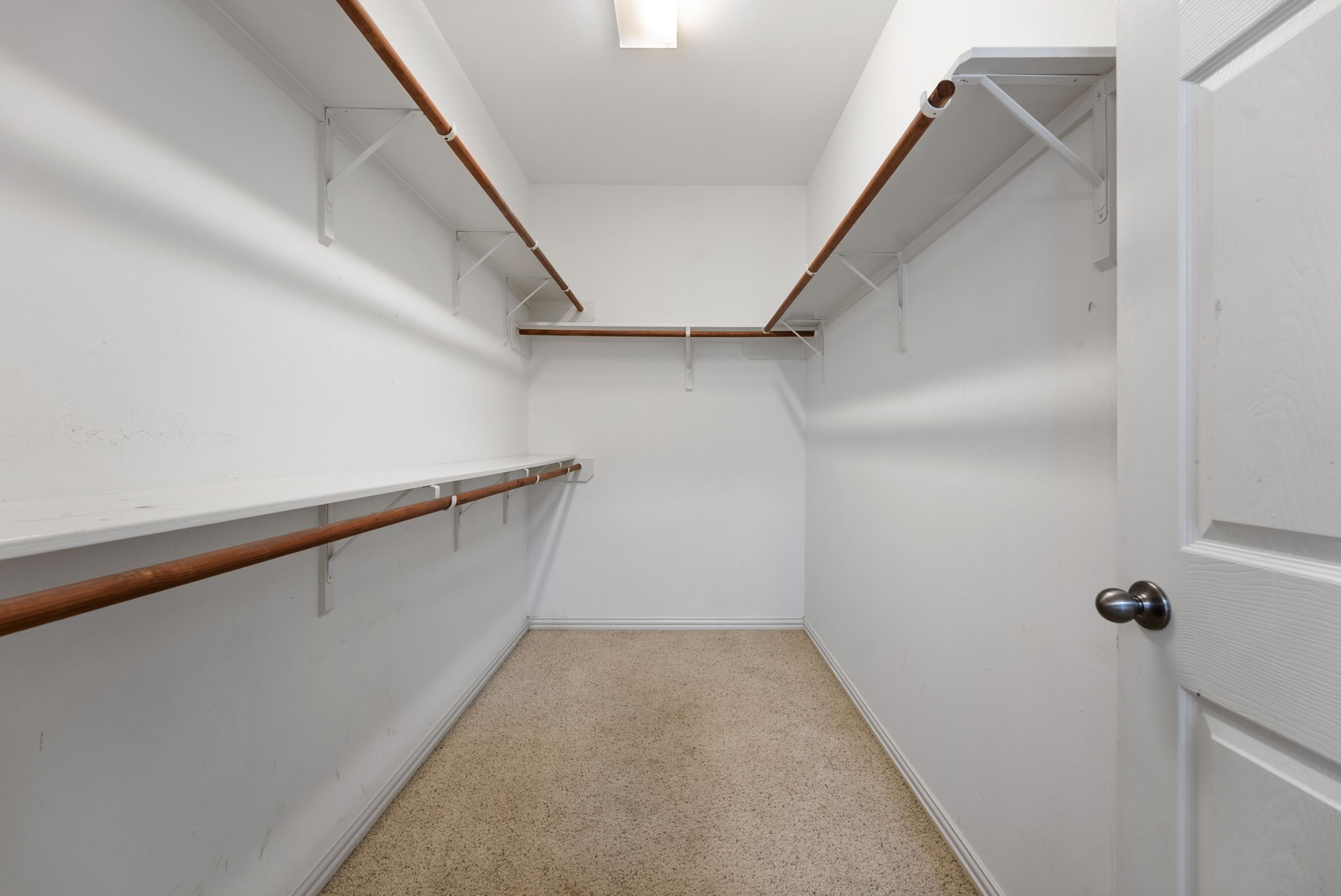 9526 Tartan Manor Street Spring, TX 77379 - Photo 29 of 42 a view of a hallway with stairs