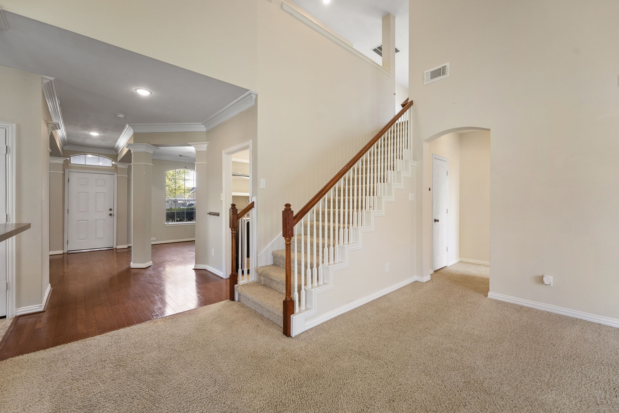 9526 Tartan Manor Street Spring, TX 77379 - Photo 32 of 42 a view of entryway and hall with wooden floor