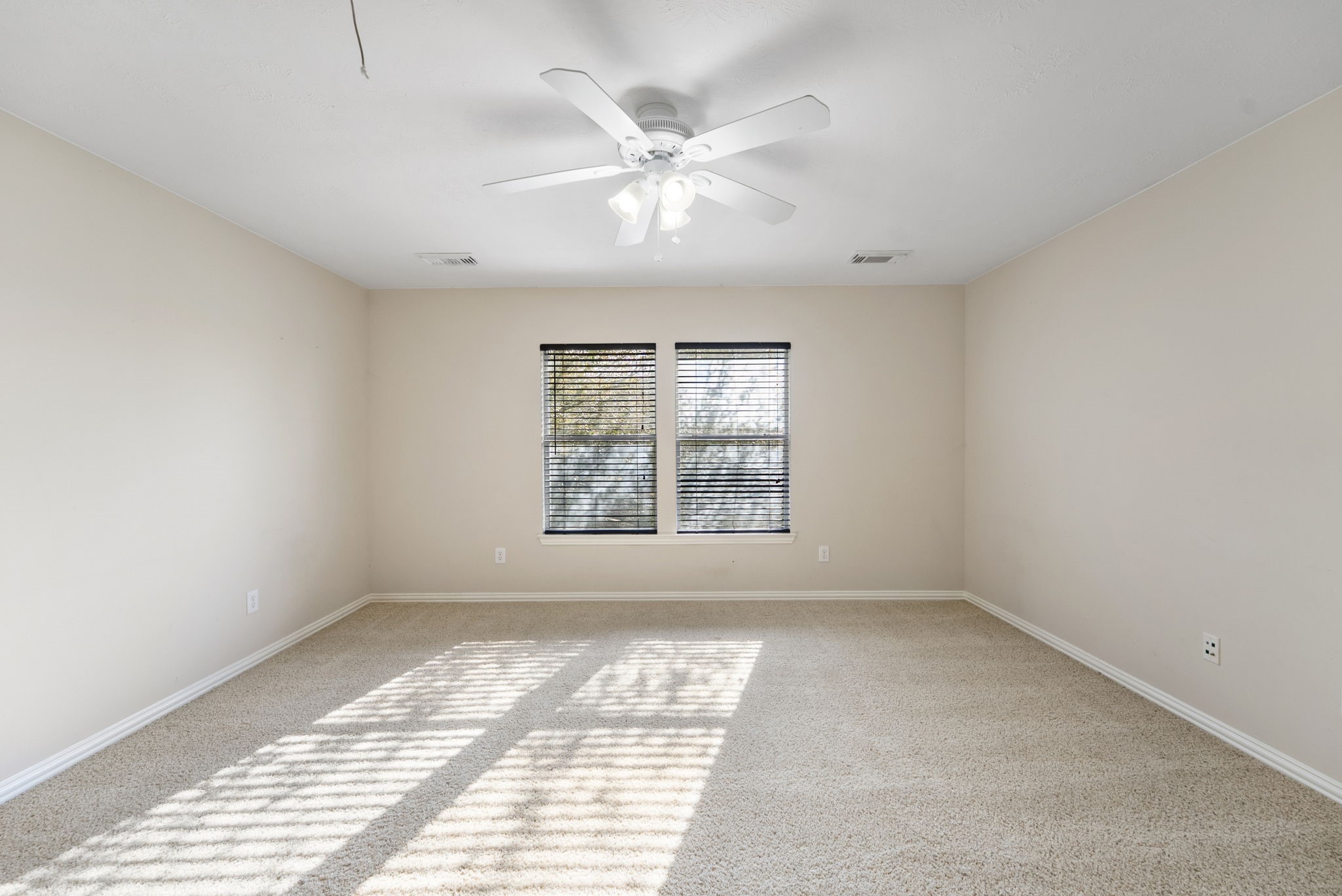 9526 Tartan Manor Street Spring, TX 77379 - Photo 33 of 42 a view of an empty room with a window