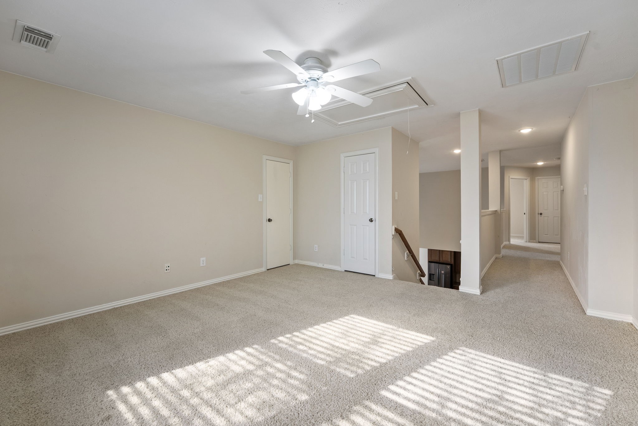 9526 Tartan Manor Street Spring, TX 77379 - Photo 34 of 42 a view of a livingroom with a ceiling fan and window