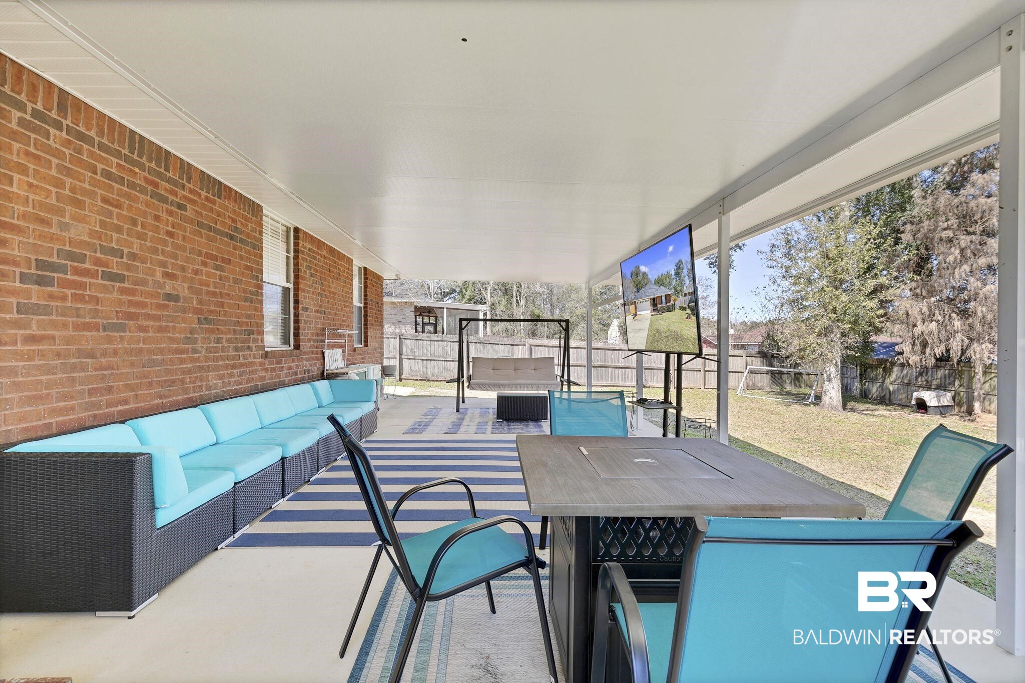11103 Pontchartrain Loop Daphne, AL 36526 - Photo 6 of 29 View of patio / terrace with outdoor dining space, an outdoor living space, and a fenced backyard