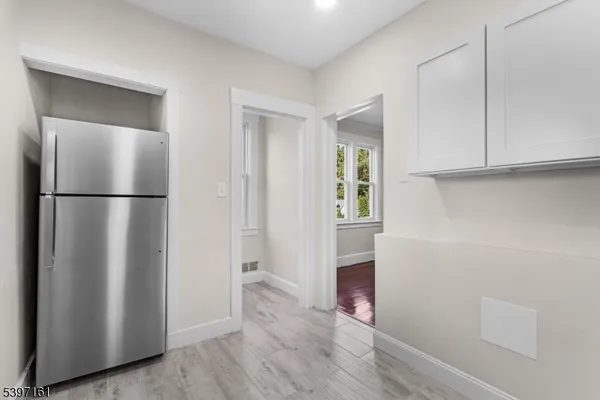 a view of walk in closet with window