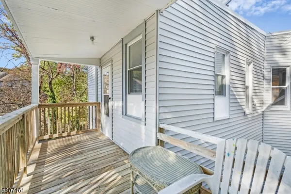 a view of a lake with a house in the background