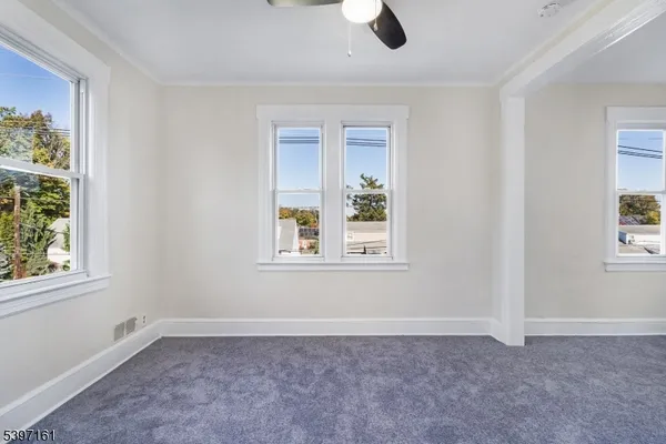 an empty room with windows