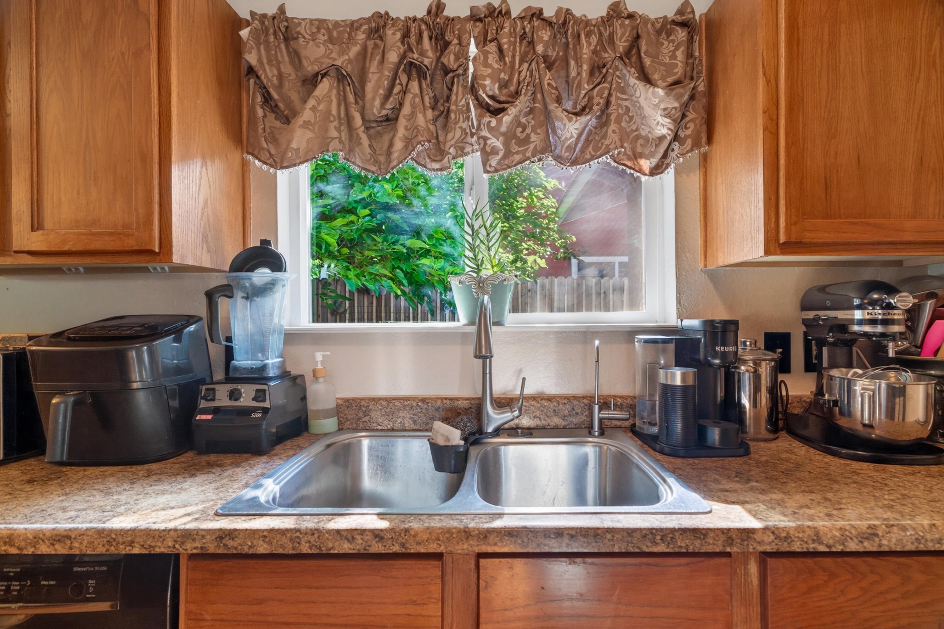 1391 Rouge Road Shasta Lake, CA 96019 - Photo 13 of 30 a kitchen with a sink and a stove top oven
