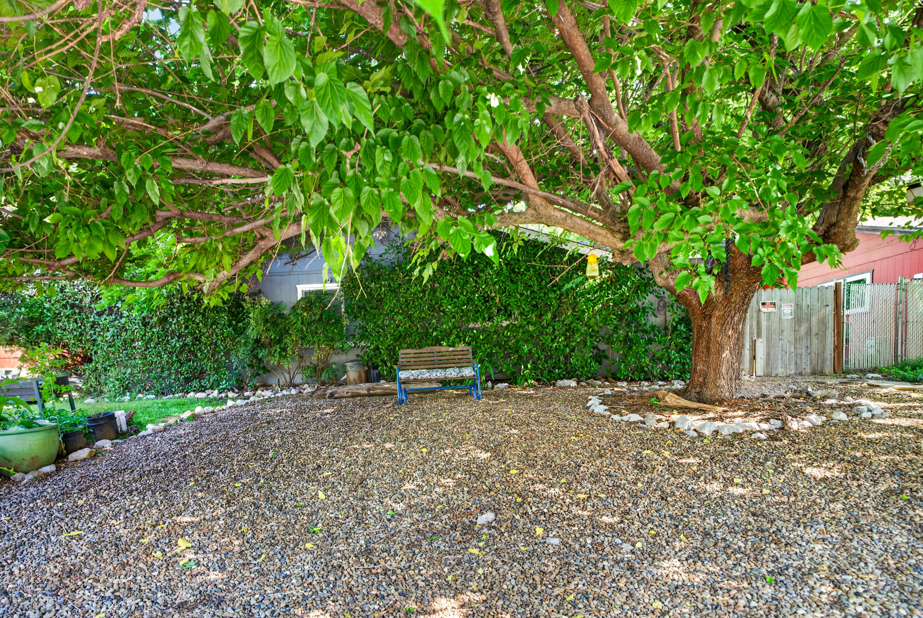 1391 Rouge Road Shasta Lake, CA 96019 - Photo 7 of 30 a view of a backyard with a trees