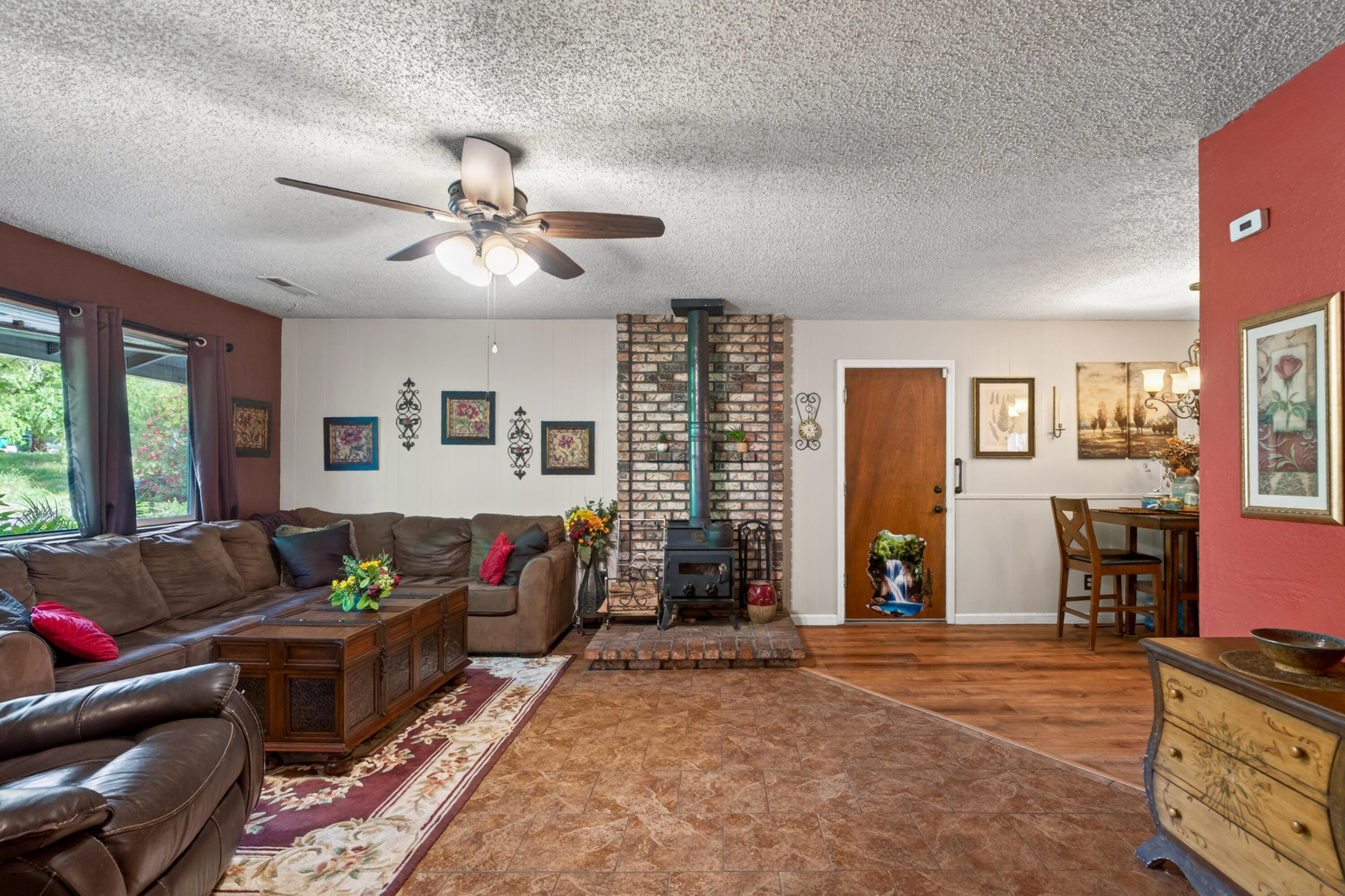 1391 Rouge Road Shasta Lake, CA 96019 - Photo 8 of 30 a living room with furniture and wooden floor