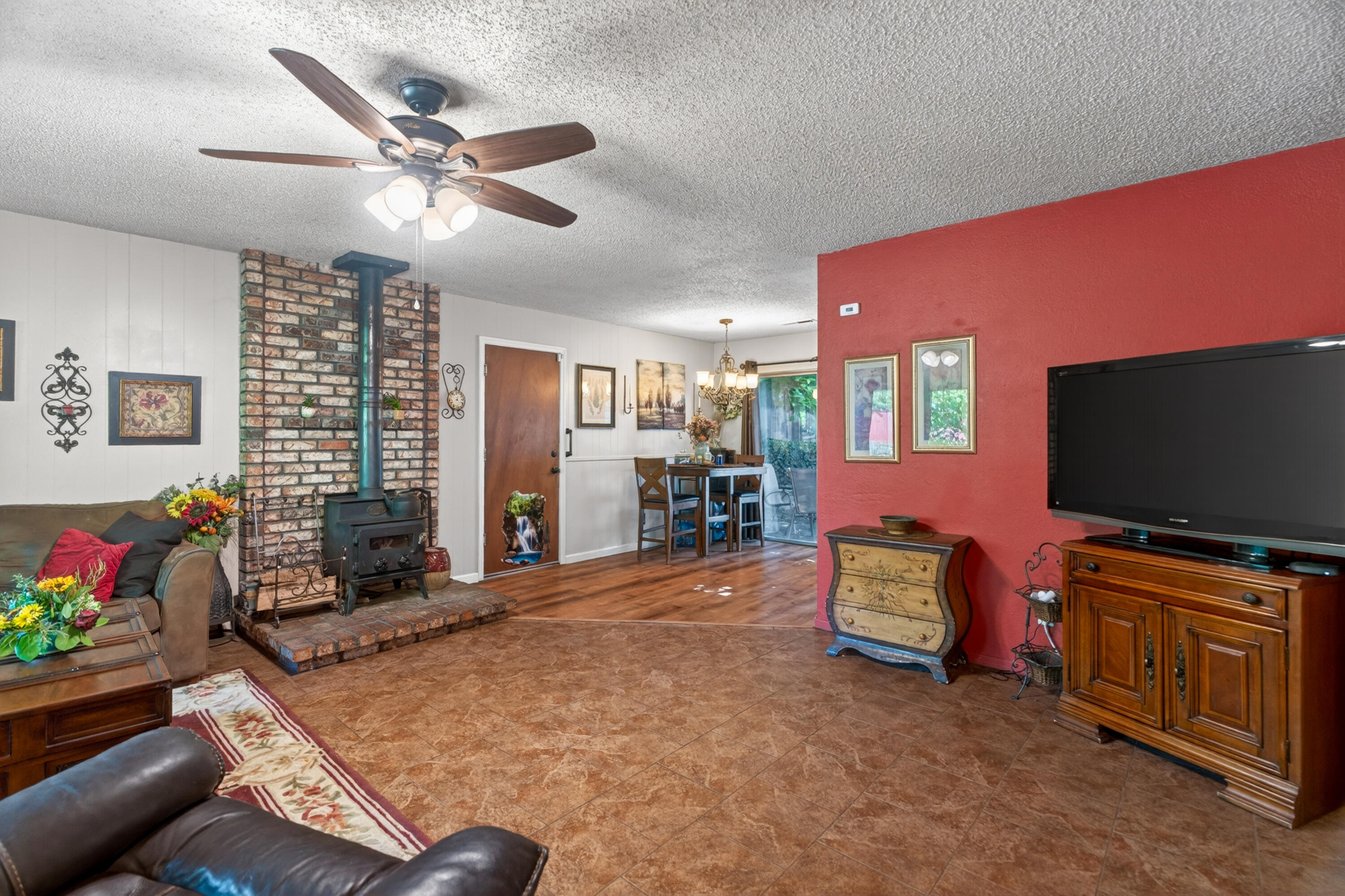1391 Rouge Road Shasta Lake, CA 96019 - Photo 10 of 30 a living room with furniture and a flat screen tv