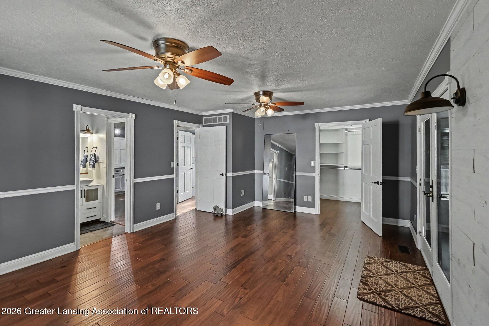 5490 West Howe Road Dewitt, MI 48820 - Photo 16 of 59 Main Floor Primary Suite