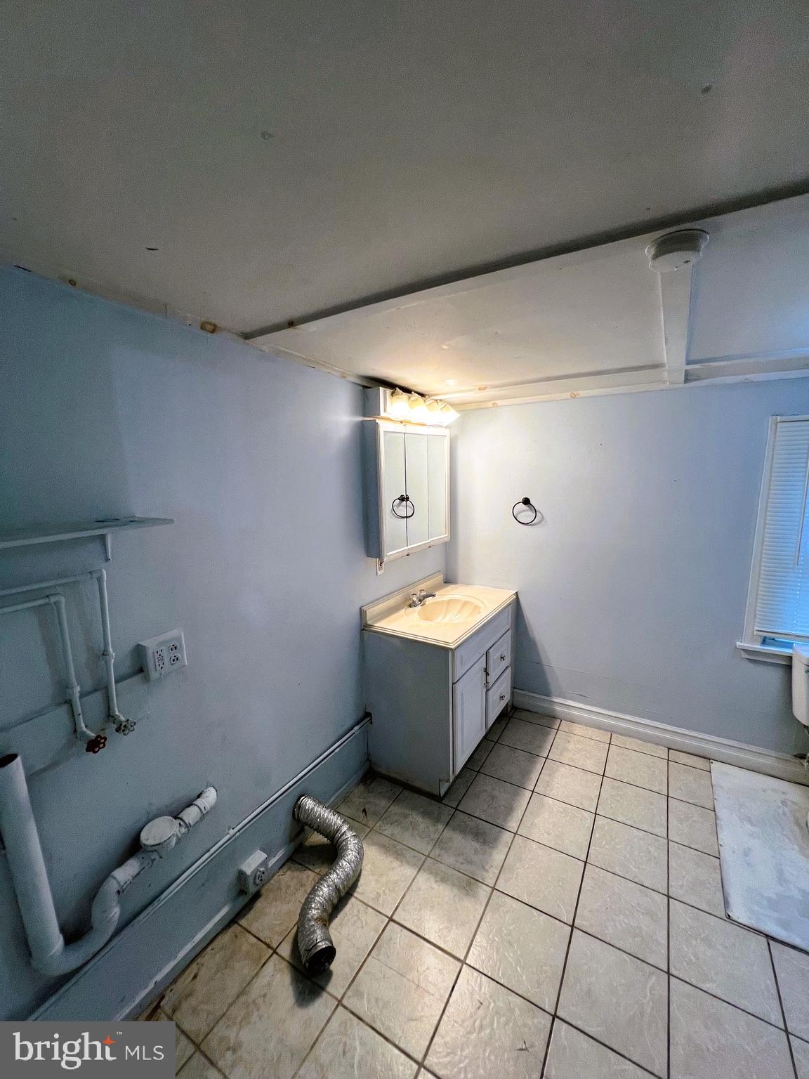18 New Street Bridgeton, NJ 08302 - Photo 10 of 24 1st Floor bath with Laundry
