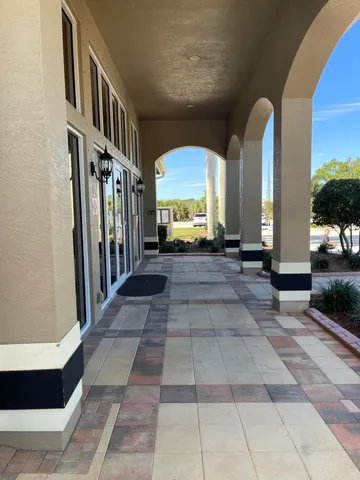 a view of an entryway door front of house
