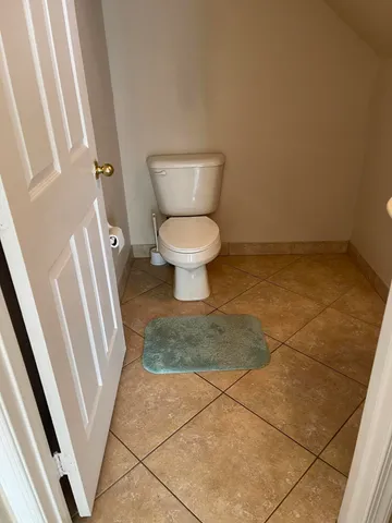 a bathroom with a toilet and a sink