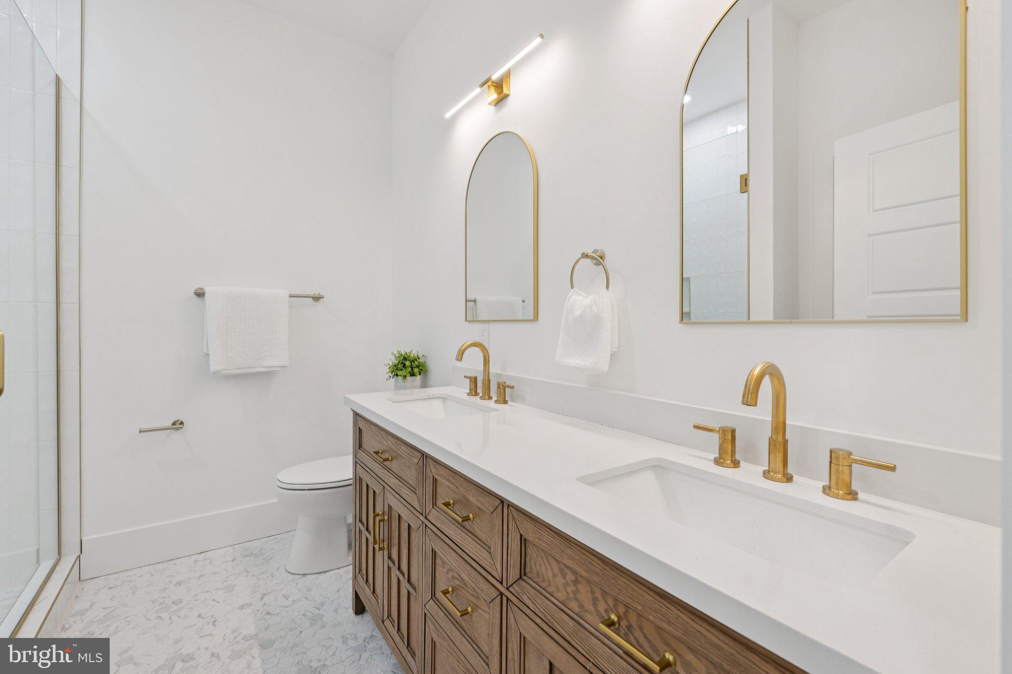 1827 North Capitol Street Northeast Washington, DC 20002 - Photo 22 of 53 a bathroom with a sink and a mirror