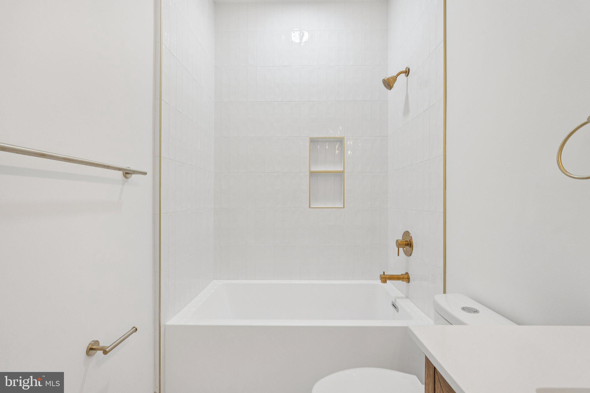 1827 North Capitol Street Northeast Washington, DC 20002 - Photo 30 of 53 a bathroom with a bathtub and a shower