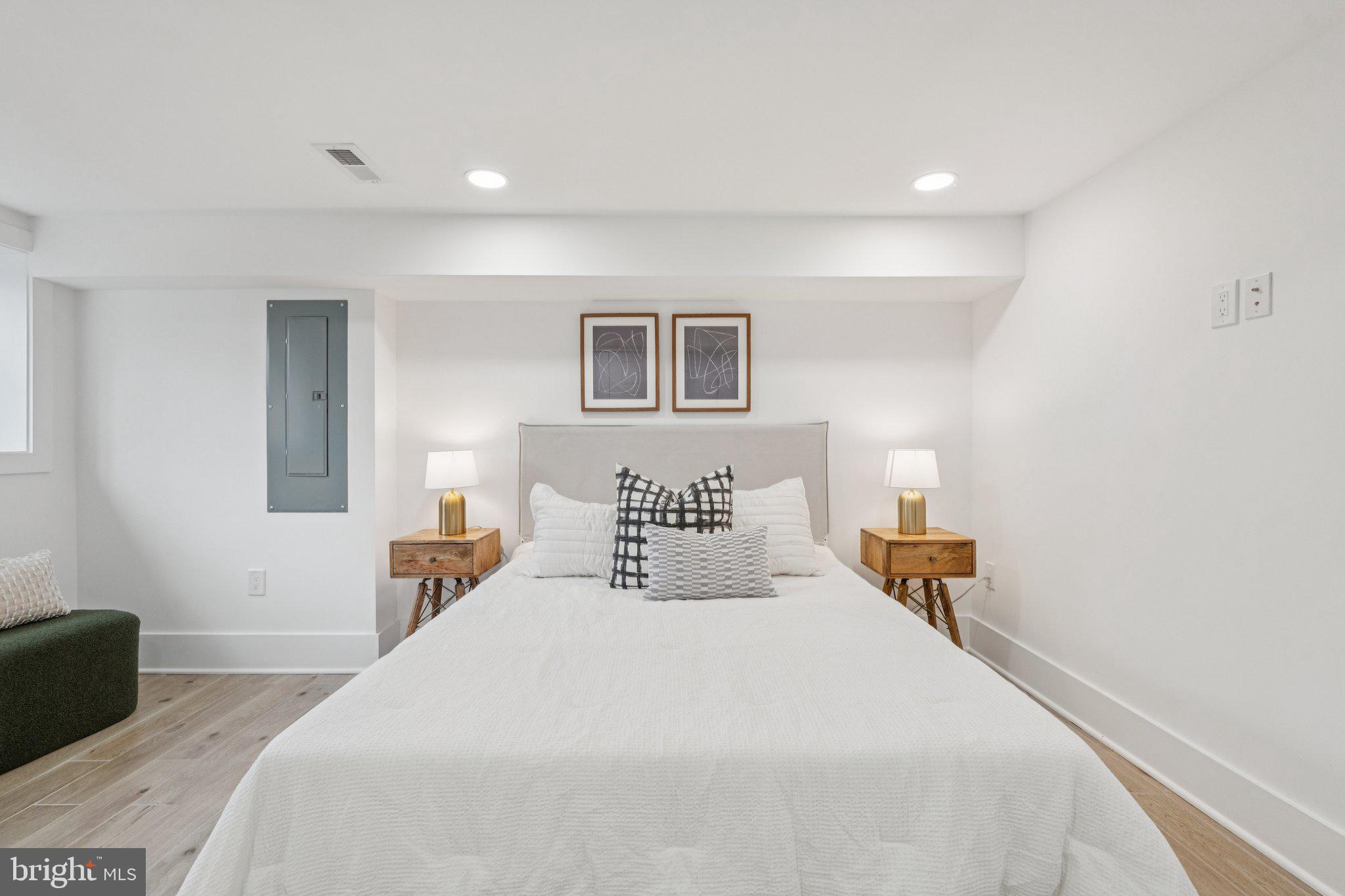 1827 North Capitol Street Northeast Washington, DC 20002 - Photo 41 of 53 a bedroom with a bed and a couch