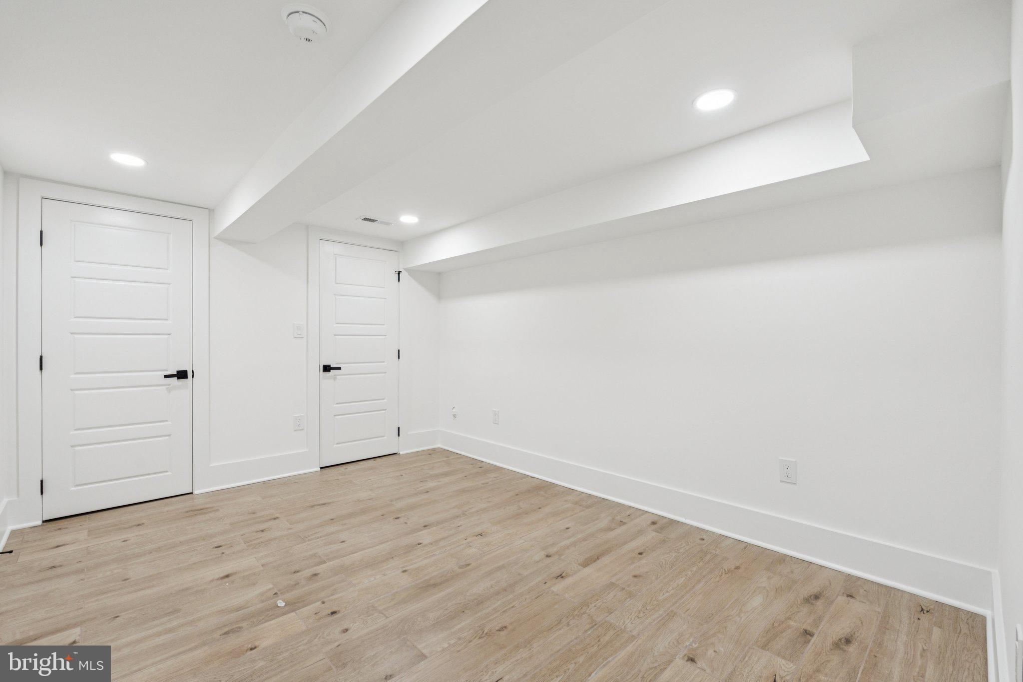 1827 North Capitol Street Northeast Washington, DC 20002 - Photo 45 of 53 wooden floor in an empty room