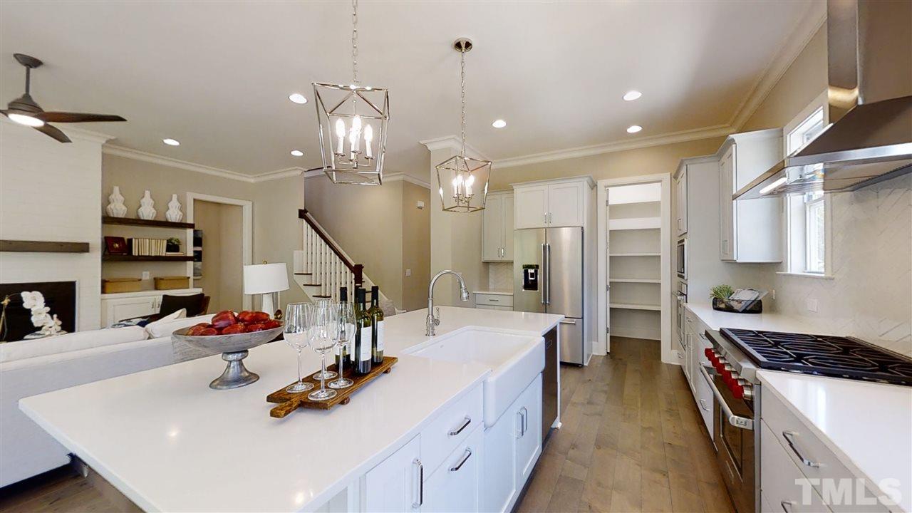 3036 Eden Harbor Court Raleigh, NC 27613 - Photo 4 of 22 Kitchen has walk-in pantry
