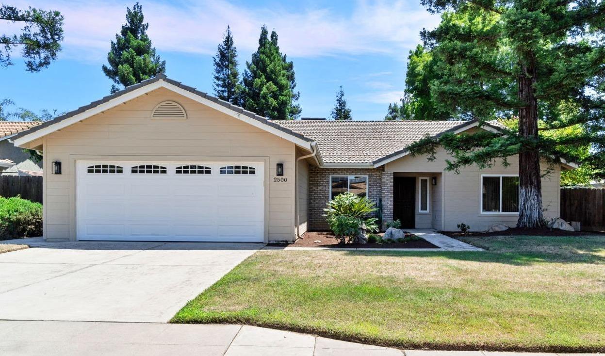 2500 Mitchell Avenue Clovis, CA 93611 - Photo 1 of 31 a view of a house with garden