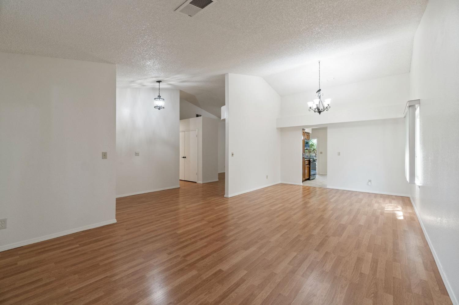 2500 Mitchell Avenue Clovis, CA 93611 - Photo 14 of 31 a view of empty room with wooden floor