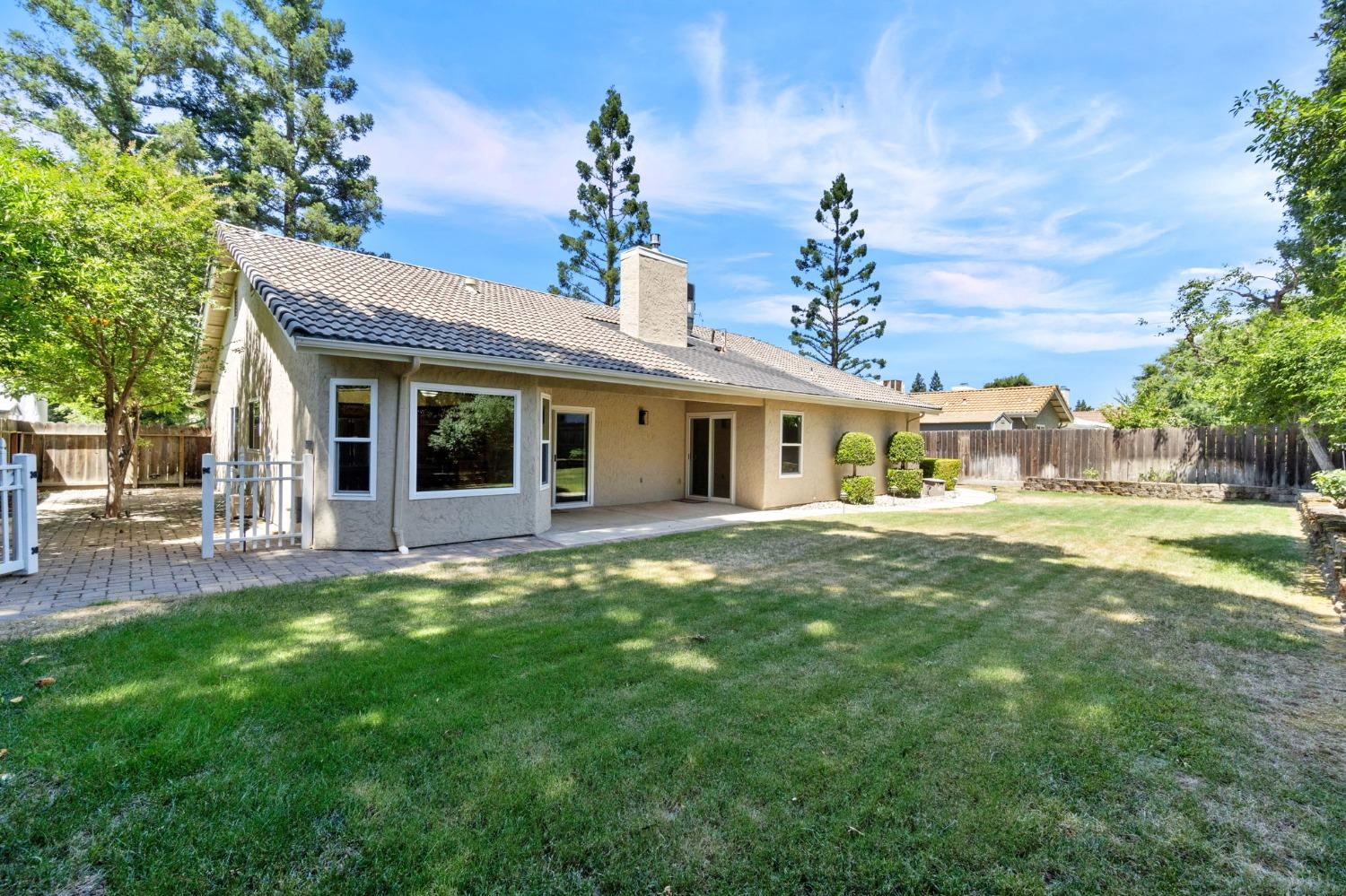 2500 Mitchell Avenue Clovis, CA 93611 - Photo 30 of 31 a front view of a house with a garden