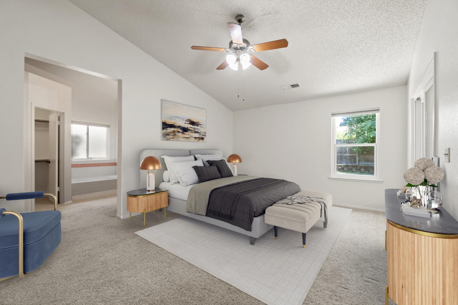 2500 Mitchell Avenue Clovis, CA 93611 - Photo 6 of 31 a spacious bedroom with a bed couch and window