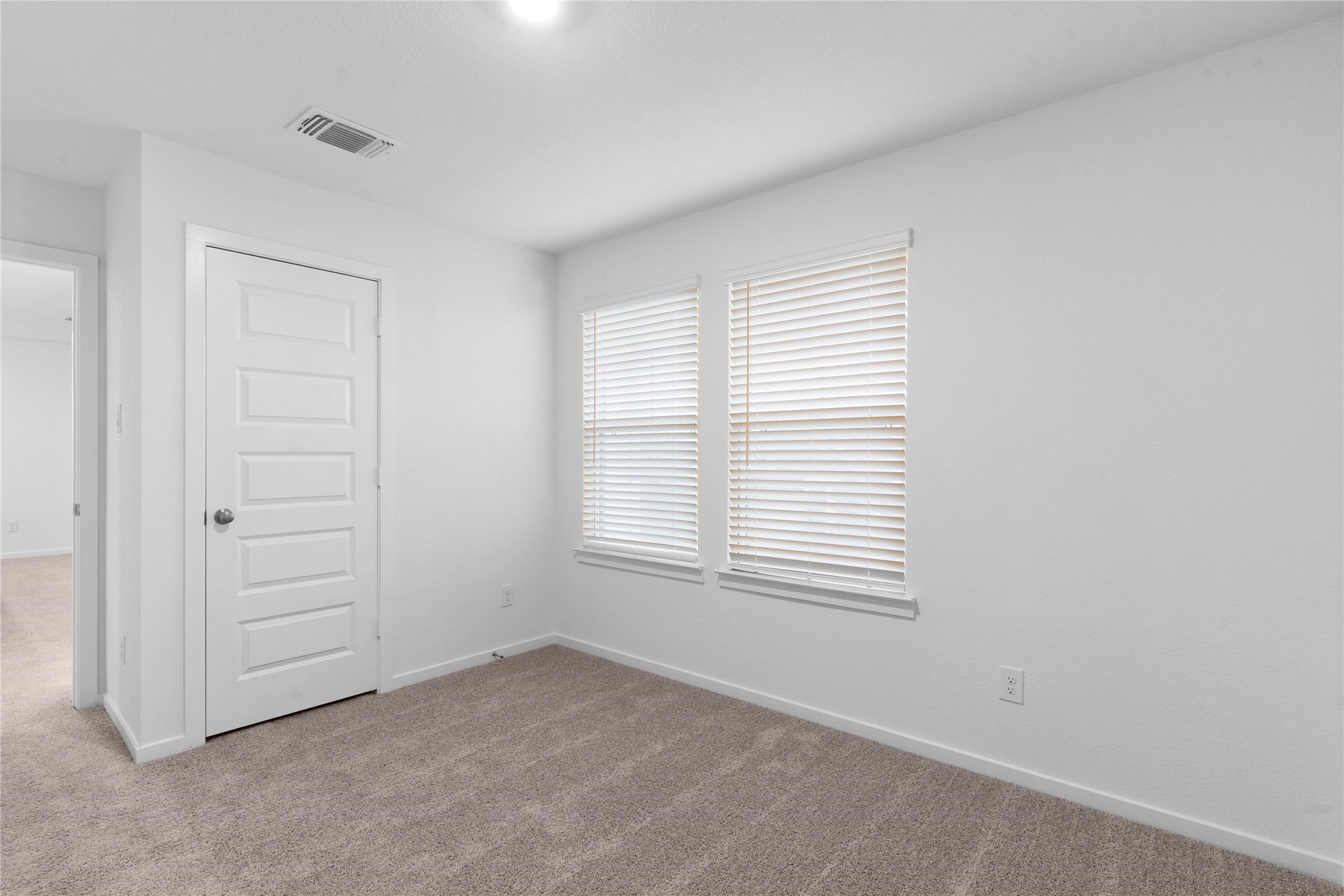 25612 Wheat Seed Lane Elgin, TX 78621 - Photo 24 of 26 an empty room with windows