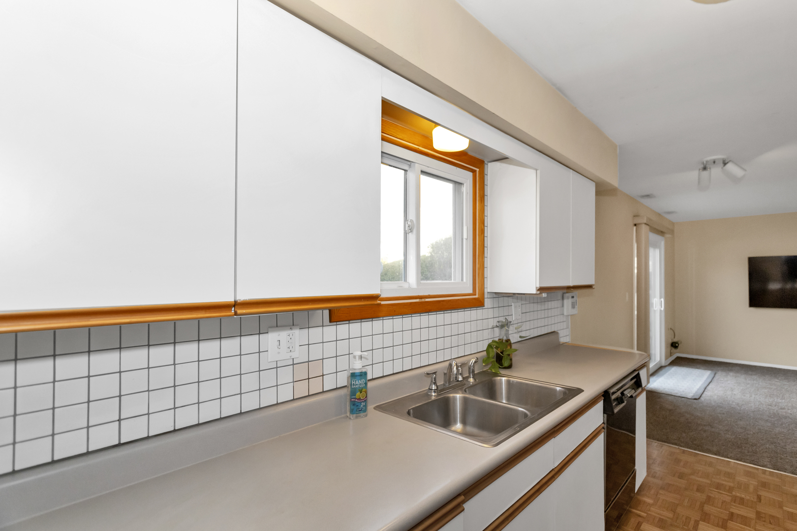 664 Claridge Circle Hoffman Estates, IL 60169 - Photo 12 of 35 a bathroom with a sink and a large mirror