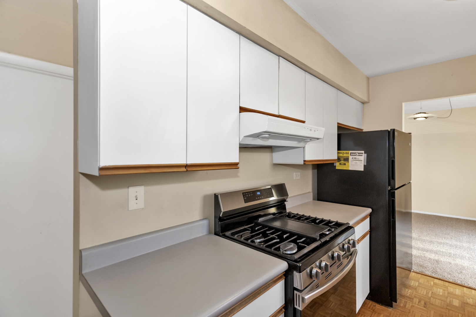 664 Claridge Circle Hoffman Estates, IL 60169 - Photo 15 of 35 a kitchen with stainless steel appliances a stove and a refrigerator