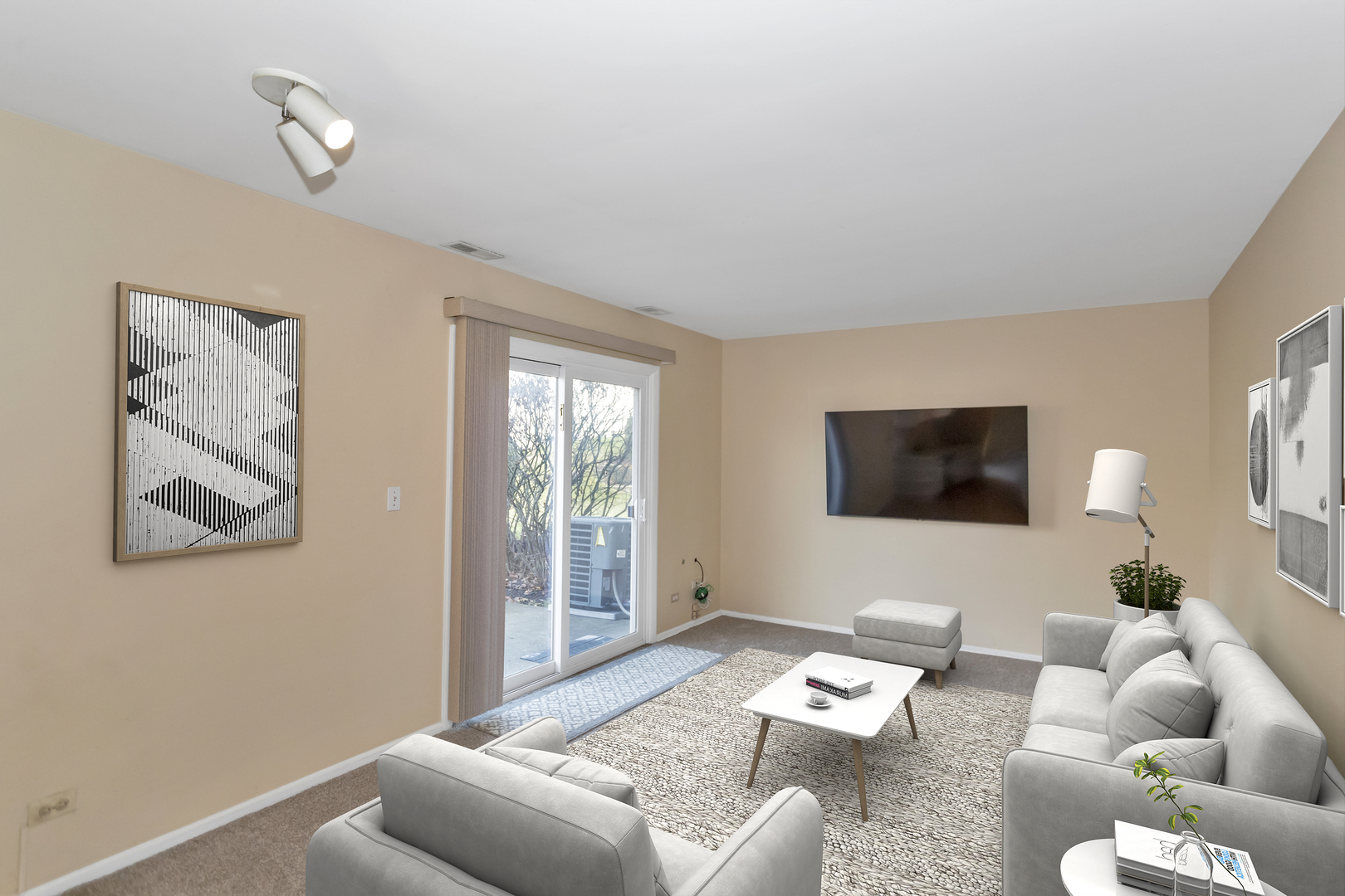 664 Claridge Circle Hoffman Estates, IL 60169 - Photo 16 of 35 a living room with furniture a window and a flat screen tv