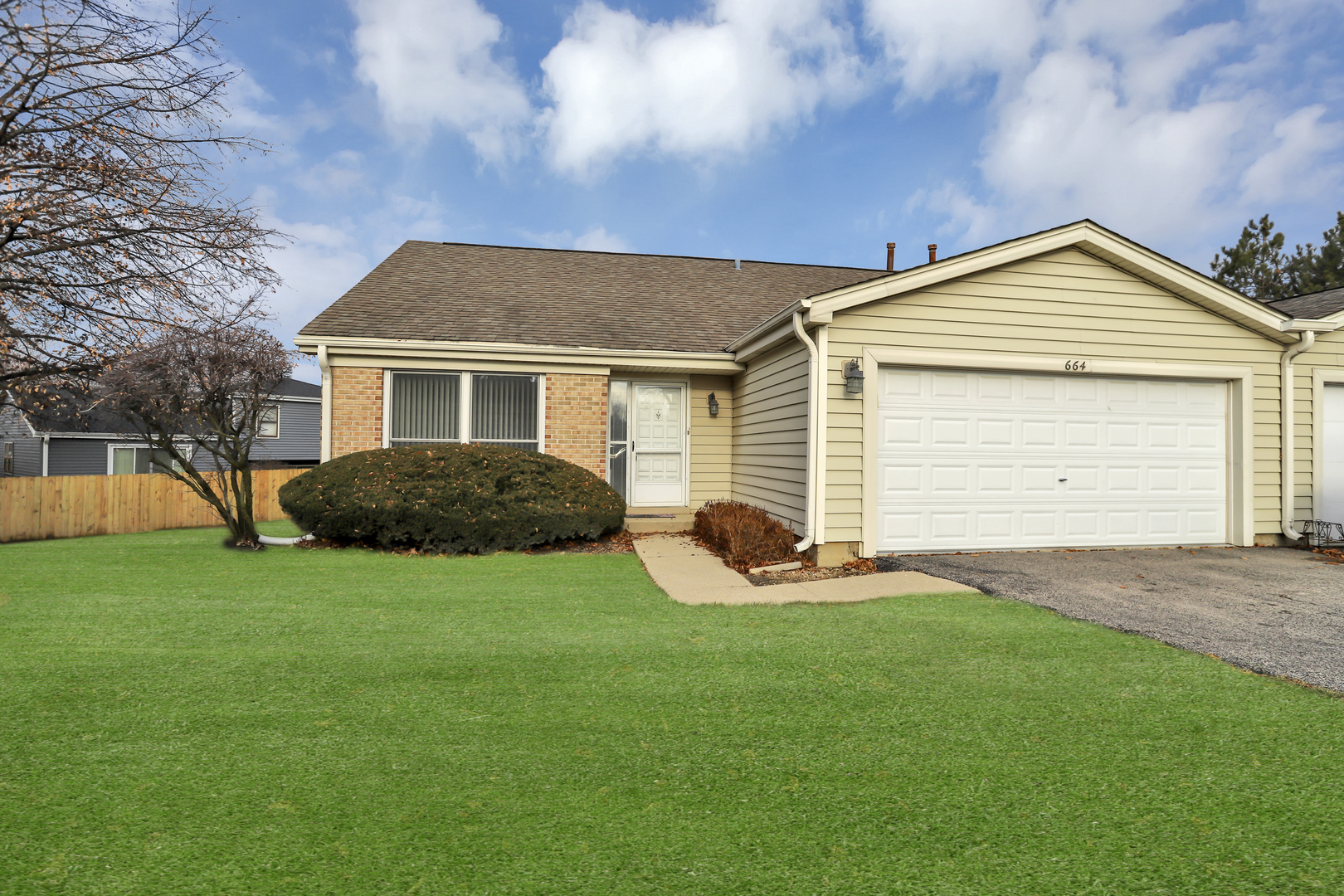 664 Claridge Circle Hoffman Estates, IL 60169 - Photo 2 of 35 a front view of house with yard and green space