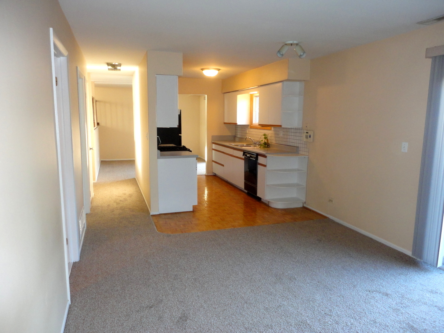 664 Claridge Circle Hoffman Estates, IL 60169 - Photo 27 of 35 a kitchen with a refrigerator and a stove