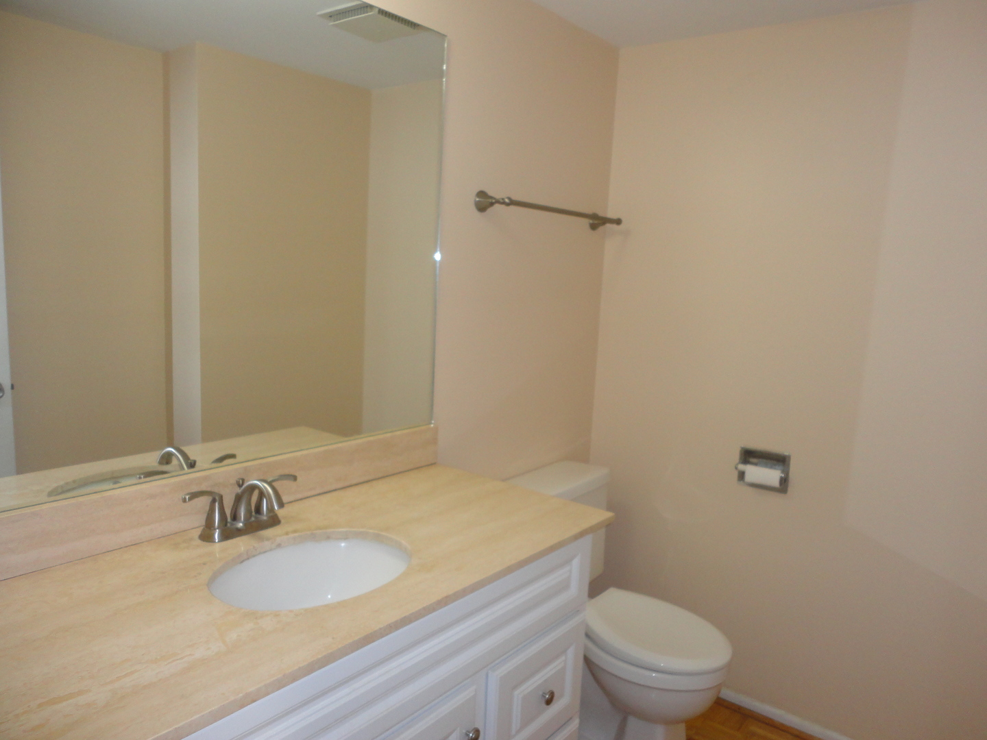 664 Claridge Circle Hoffman Estates, IL 60169 - Photo 32 of 35 a bathroom with a granite countertop sink a mirror and a toilet