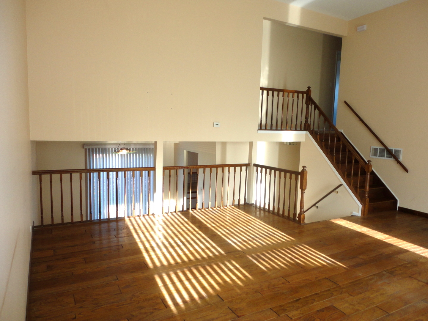 664 Claridge Circle Hoffman Estates, IL 60169 - Photo 8 of 35 a view of entryway with wooden floor