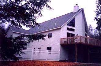 a view of a house with a balcony