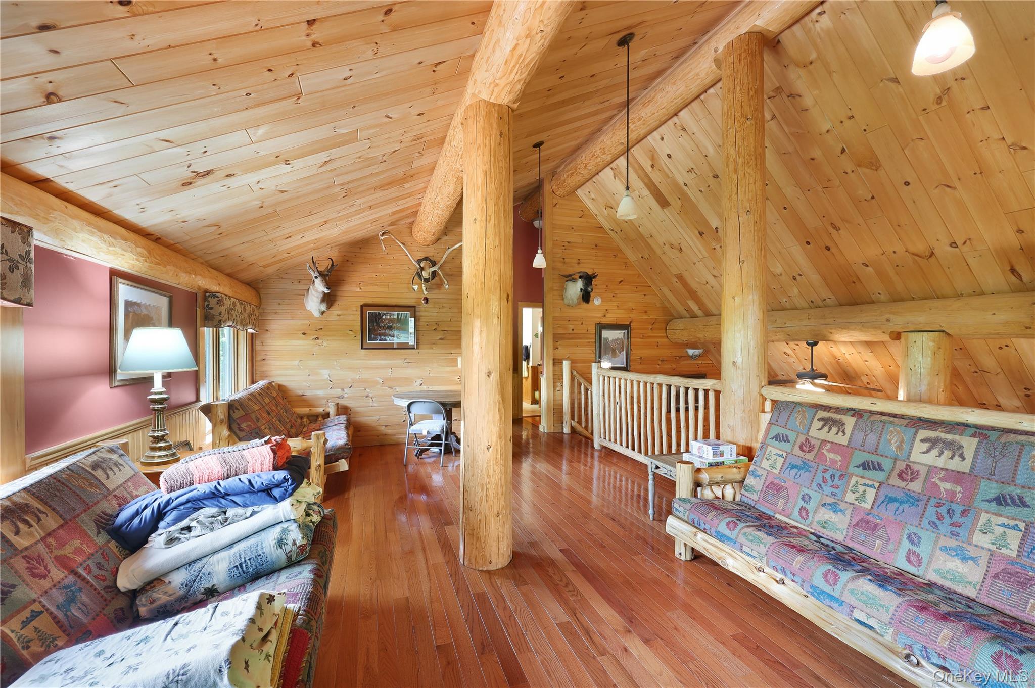 25 Cauthers Road Fallsburg, NY 12789 - Photo 14 of 27 a living room with furniture and wooden floor