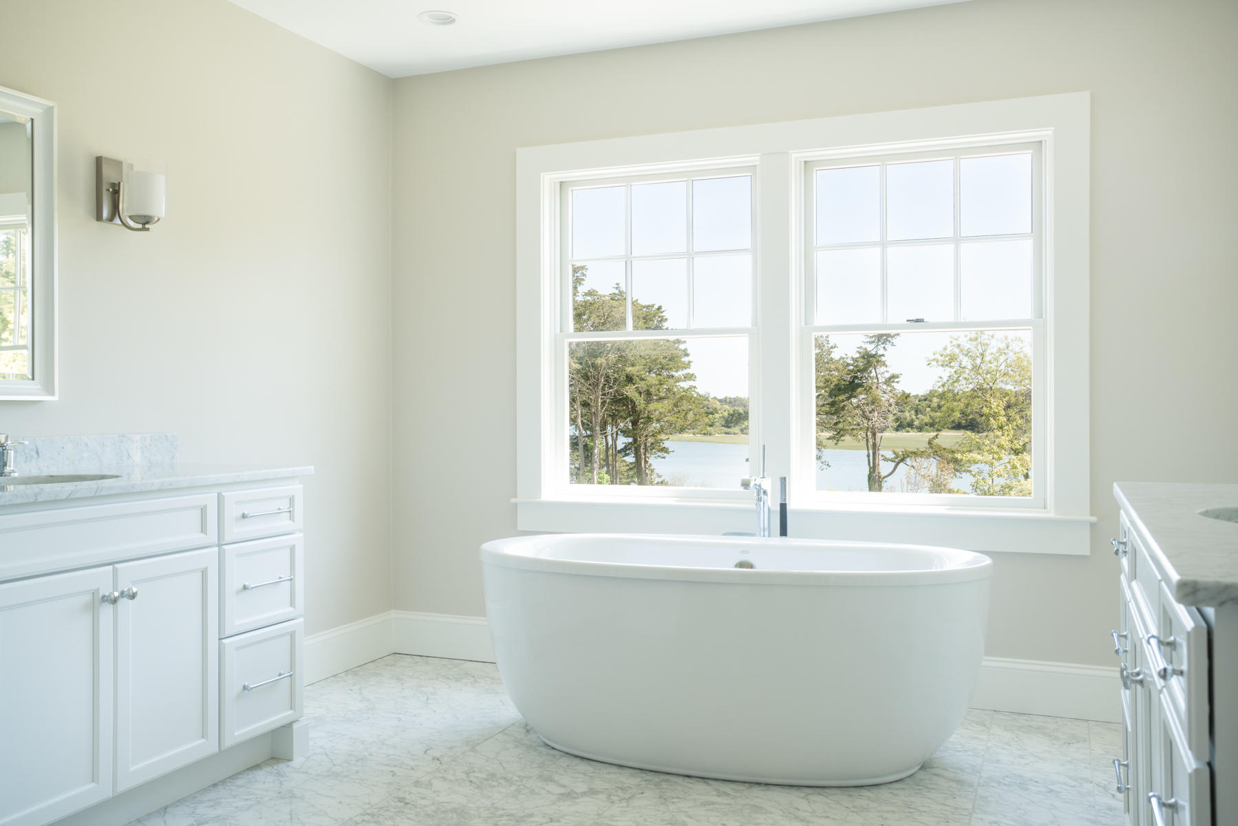 43 Payson Lane Orleans, MA 02653 - Photo 21 of 34 a white bath tub sitting in a bathroom