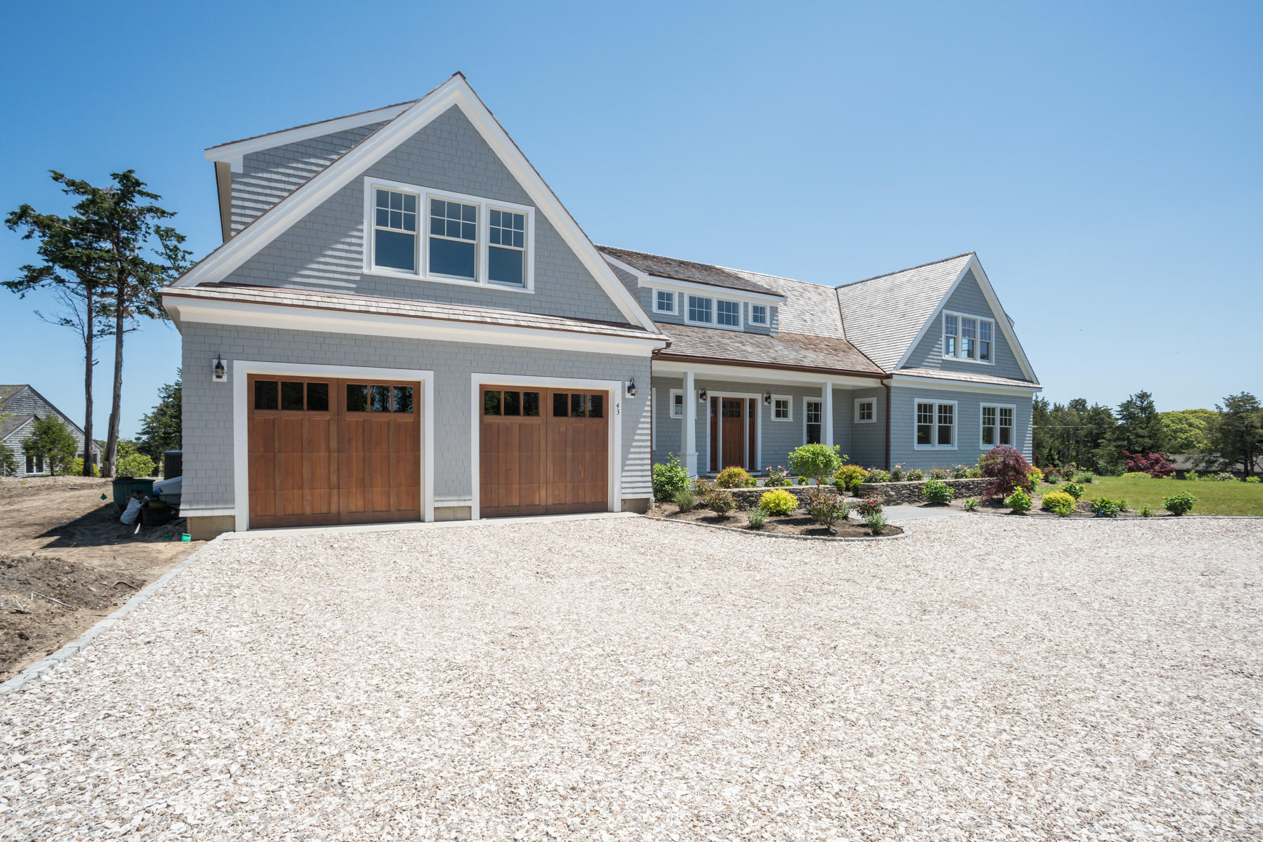 43 Payson Lane Orleans, MA 02653 - Photo 28 of 34 a front view of a house with yard and porch